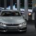 Ian Robertson, head of sales and marketing for BMW, shows of a 4 Series Coupe during the press presentation at the North American International Auto Show during the press preview on Monday, Jan. 14, at Cobo Center in Detroit.   Melanie Maxwell I AnnArbor.com 